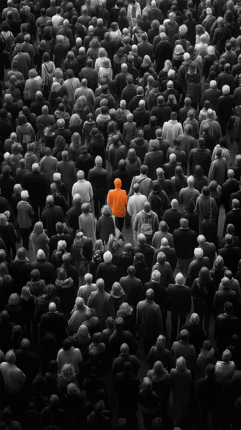 Person in Orange Hoodie Among Dense Crowd from Above