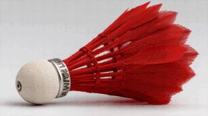 Close-Up of Red Feathered Shuttlecock on White Surface