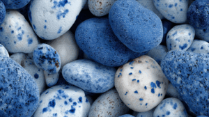 Bright Blue and White Spotted Pebbles in Natural Cluster