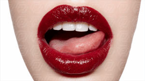 Red Glossy Lips with Tongue Licking in Sensual Close-Up