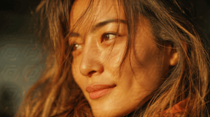 Peaceful Woman with Hair in the Breeze