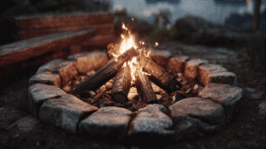 Campfire in Stone Ring Glowing at Dusk
