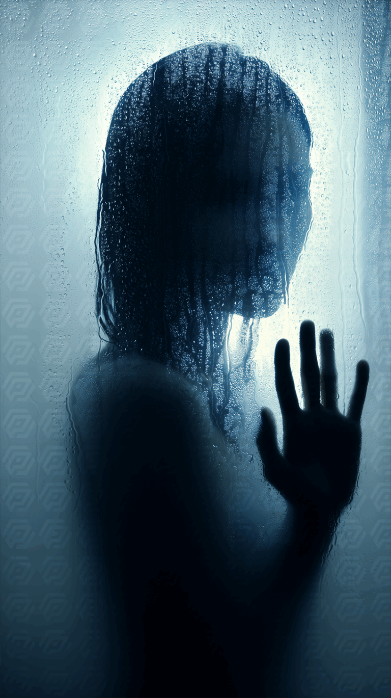 Silhouetted Woman Behind Wet Blue Glass With Hand Raised