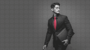 Stylish Businessman in Monochrome with Red Tie and Folder