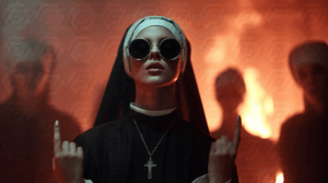 Fiery Nun Leading a Procession Amid Flames