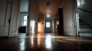 Sunlight Casting Shadows in a Quiet Residential Hallway