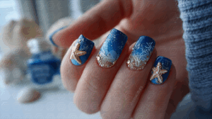 Nautical Nail Art With Starfish And Coral Reef Details