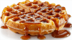Belgian Waffle Topped With Syrup And Powdered Sugar Dessert