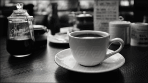 Black and White Coffee Cup in Urban Café Setting